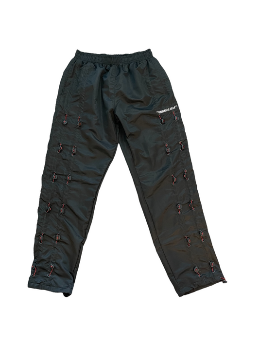 "UNREALISM" ZIP TIE GALORE  PANTS (Unisex)